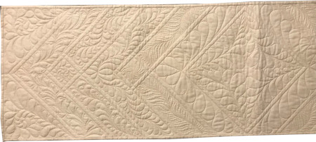 image of free motion feathers on a quilt